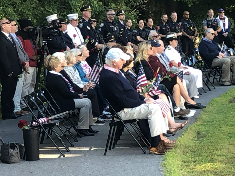 Seated at 9/11 ceremony 2025